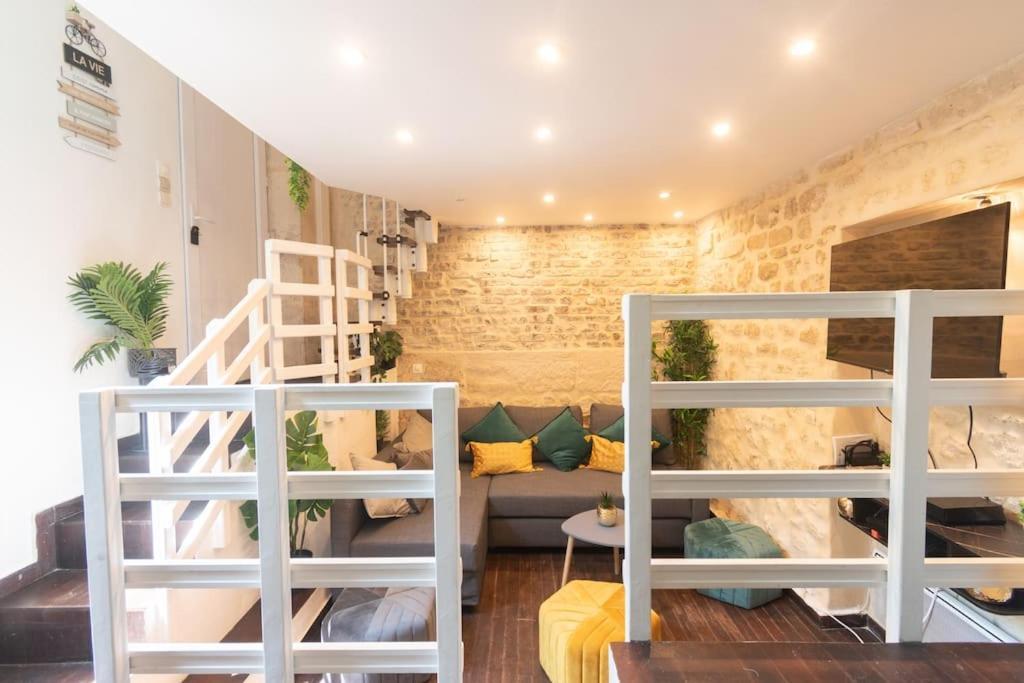 Duplex Parisien En Face Metro13 Appartement Paris